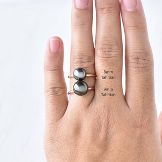 Tahitian pearl Kahi stacking ring by Yay Hawaii featuring a lustrous black pearl and minimalist gold band design