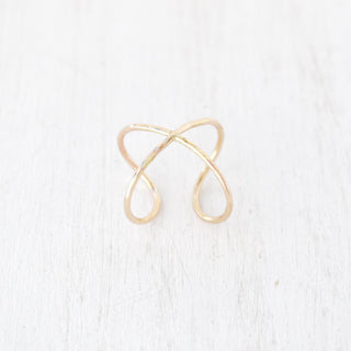 Yay Hawaii Loa Infinity Ring featuring a sleek silver band with an infinity symbol design on a white background.