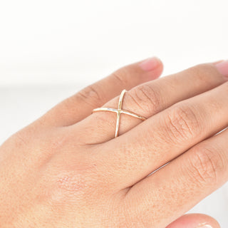 Yay Hawaii Loa Infinity Ring featuring a sleek gold infinity design with minimalist style and smooth finish.