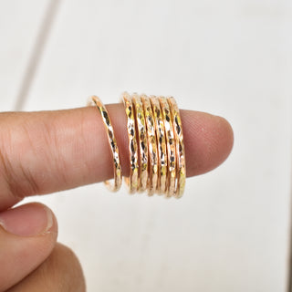 Set of Yay Hawaii Monstera and stacking rings, featuring green leaf design and silver bands on a white background.
