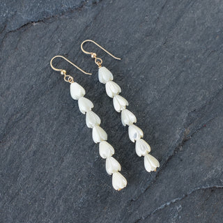 Small mother of pearl Pikake cluster earrings by Yay Hawaii, featuring delicate pearl flower design and adjustable length.