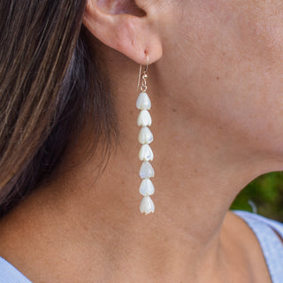 Small mother of pearl Pikake cluster earrings by Yay Hawaii, featuring delicate pearl flower design and adjustable length.