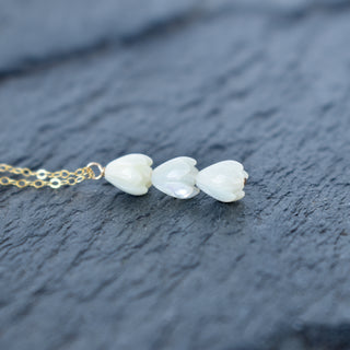 Triple small Pikake cluster vertical pendant necklace by Yay Hawaii featuring delicate floral design on silver chain