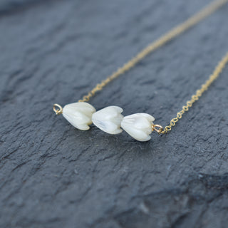 Triple small Pikake bar necklace by Yay Hawaii featuring delicate floral design and layered gold-tone bars.