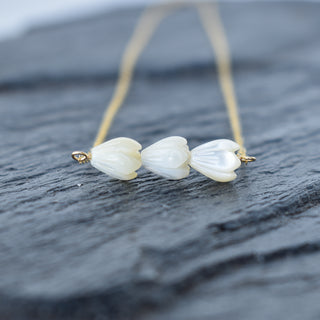 Triple small Pikake Bar necklace by Yay Hawaii featuring delicate flower-shaped pendants on a sleek chain.