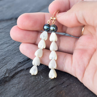 Long statement earrings by Yay Hawaii featuring five mother of pearl Pikake flowers and black freshwater pearls.