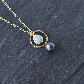 Small hoop earrings with mother of pearl Pikake design and black freshwater pearl necklace by Yay Hawaii