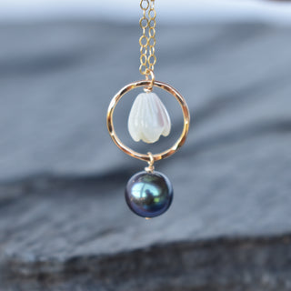 Small hoop earrings with mother of pearl Pikake design and black freshwater pearl necklace by Yay Hawaii.