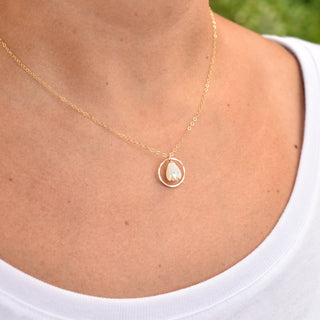 Yay Hawaii hoop earrings featuring Pikake flower design with small mother of pearl center, elegant jewelry accessory.