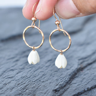 Yay Hawaii hoop earrings with dangling small Mother of Pearl Pikake flower jewelry, stylish and elegant accessory.