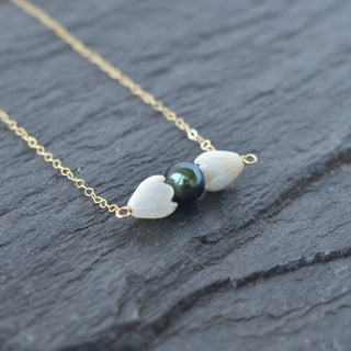 Small bar necklace featuring mother of pearl Pikake and black freshwater pearls from Yay Hawaii.
