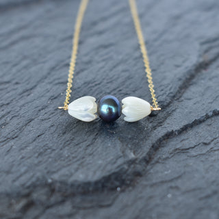 Small bar necklace with mother of pearl Pikake flower and black freshwater pearls, elegant jewelry by Yay Hawaii.