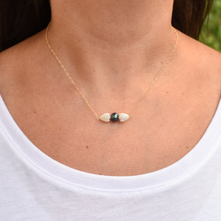 Small mother of pearl Pikake and black freshwater pearl bar necklace by Yay Hawaii, featuring delicate floral and pearl accents.