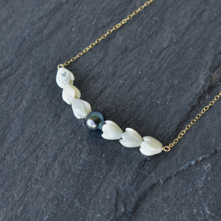 Long Pikake Pearl Bar statement necklace by Yay Hawaii featuring a elegant pearl and bar design on a gold chain.