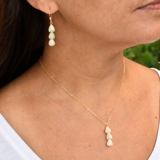 Triple small Pikake cluster vertical pendant necklace by Yay Hawaii featuring floral jewelry design with delicate white flowers.