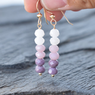 Long purple ombre cluster earrings from Yay Hawaii featuring cascading purple beads and silver hooks.