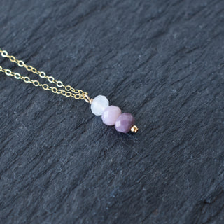 Purple ombre cluster necklace by Yay Hawaii featuring multiple beads and a vibrant, layered design.