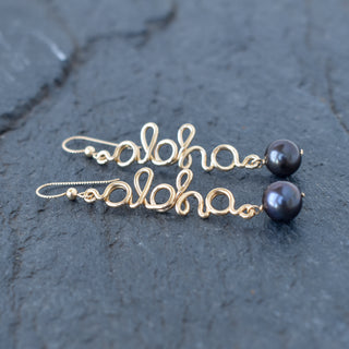 Black pearl Aloha dangle earrings by Yay Hawaii featuring elegant black pearls and tropical-inspired design.