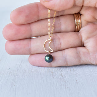 Crescent moon necklace with 8mm black freshwater pearl pendant, showcasing Yay Hawaii jewelry on a white background.