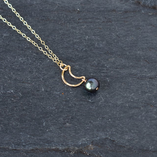 Yay Hawaii crescent moon necklace with 8mm black freshwater pearl and silver chain, elegant jewelry accessory.