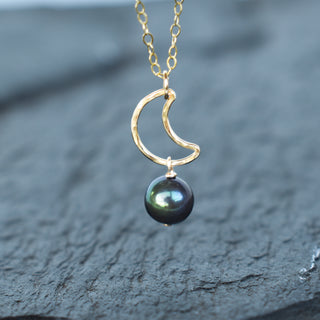 Black freshwater pearl crescent moon necklace by Yay Hawaii featuring an 8mm pearl on a delicate chain.