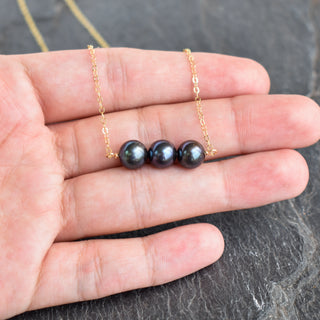 Yay Hawaii black freshwater pearl bar necklace featuring three 8mm pearls on a sleek silver chain.