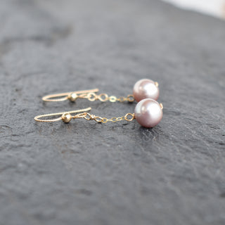 Dainty light purple pearl single dangle earrings by Yay Hawaii featuring elegant pearl and delicate design