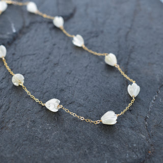 Small mother of pearl Pikake Station Necklace by Yay Hawaii featuring delicate pearl flower charms on a fine chain.