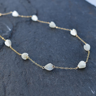 Small mother of pearl Pikake Station Necklace by Yay Hawaii featuring delicate pearl flower charms on a fine chain.