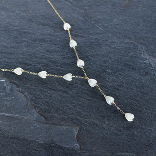 Lariat Y necklace by Yay Hawaii featuring small carved mother of pearl Pikake flowers on delicate chain