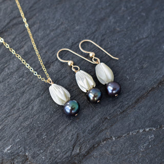 Medium Mother of Pearl Pikake necklace and earrings set with black freshwater pearls by Yay Hawaii, featuring floral jewelry design.