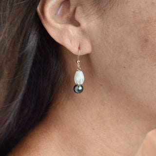 Medium Mother of Pearl Pikake necklace and earrings set with black freshwater pearls by Yay Hawaii, featuring floral and pearl accents.