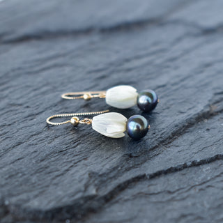 Medium mother of pearl Pikake necklace and earrings set with black freshwater pearls by Yay Hawaii, featuring floral jewelry design.