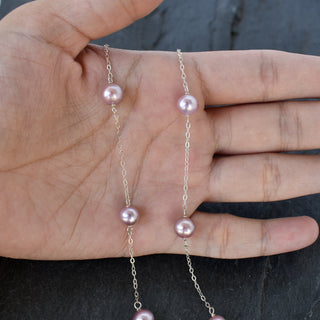 Dainty light purple pearl station necklace by Yay Hawaii featuring small round pearls on a delicate chain.
