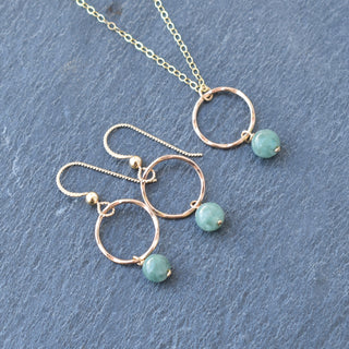 Small gold hoops with dangling 6mm jade stones, stylish earrings from Yay Hawaii featuring natural green jade.