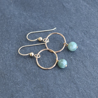 Small Yay Hawaii hoops with dangling 6mm jade beads, featuring gold-tone metal and a simple, elegant design for everyday wear.