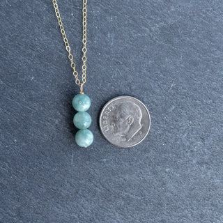 Yay Hawaii Triple 6mm jade cluster vertical pendant necklace featuring a sleek, elegant design with multiple jade stones.