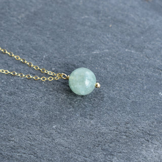 10mm jade vertical pendant necklace with gold accent bead by Yay Hawaii, featuring a sleek green jade stone and elegant gold details.