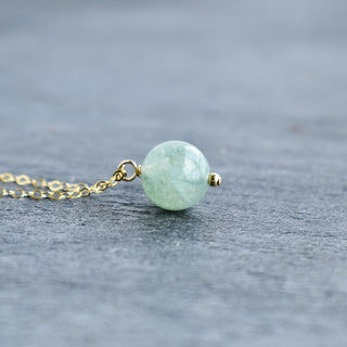 10mm jade vertical pendant necklace with gold accent bead, featuring a sleek, elegant design by Yay Hawaii.