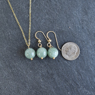 10mm jade vertical pendant necklace with gold accent bead, elegant jewelry piece from Yay Hawaii featuring green jade and gold details.
