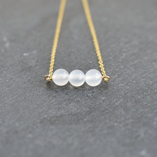 White agate gemstone triple cluster necklace featuring 6mm stones, crafted by Yay Hawaii for elegant jewelry styling.