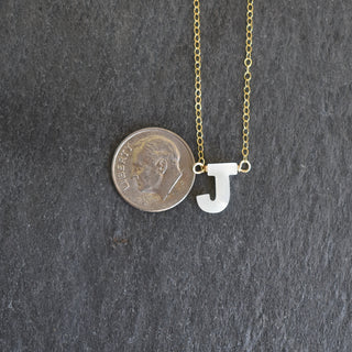 Mother of Pearl initial necklace by Yay Hawaii featuring a elegant pearl pendant with a personalized initial.