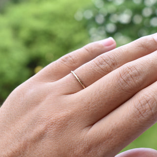 Yay Hawaii Hulali Shimmer Stacking Ring with iridescent finish, sleek design, and multiple bands for stylish layered look.