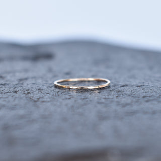 Yay Hawaii Lahi Thin Stacking Ring, delicate gold band for layered jewelry, shown on a neutral background.