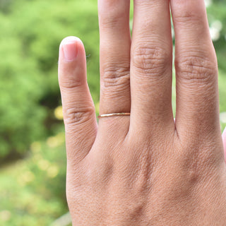 Yay Hawaii Lahi Thin Stacking Ring in silver, showcasing a sleek, minimalist design with a smooth band and subtle shine.