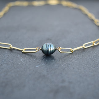 Silver paperclip necklace featuring a round Tahitian pearl by Yay Hawaii, styled on a white background.