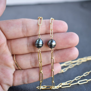 Paperclip necklace featuring a Tahitian pearl from Yay Hawaii, showcasing a sleek metal chain with a prominent dark pearl pendant.