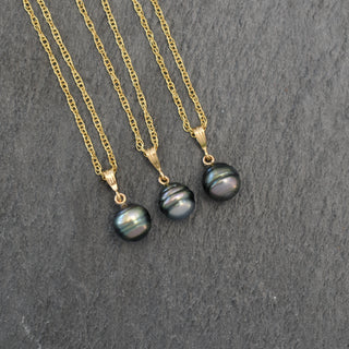 Tahitian pearl bail necklace featuring a round black Tahitian pearl on a delicate chain, crafted by Yay Hawaii.