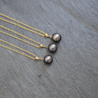 Elegant round Tahitian pearl bail necklace featuring a lustrous black pearl on a delicate chain, by Yay Hawaii.