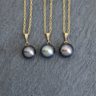 Round Tahitian pearl bail necklace featuring a lustrous black pearl on a delicate chain, crafted by Yay Hawaii.